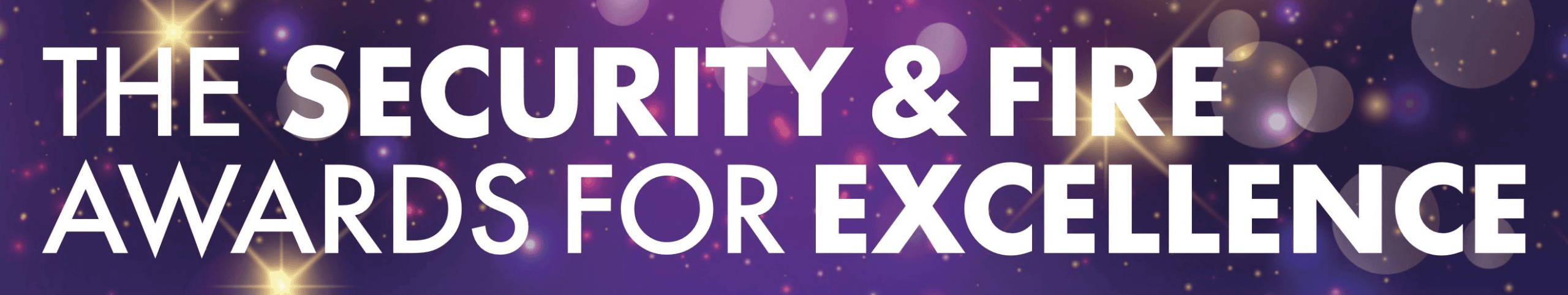 Alt text: Fire and security awards banner with bright stars and sparkles for security excellence.