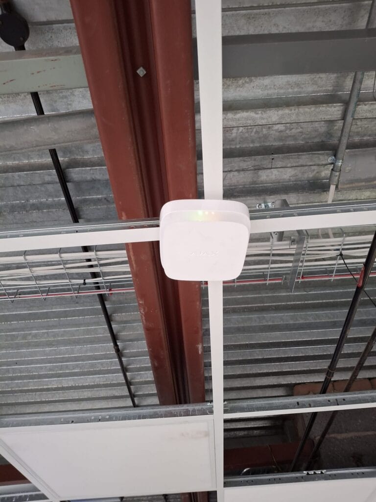 Ceiling sensor device installed at South Gyle project site for building automation.