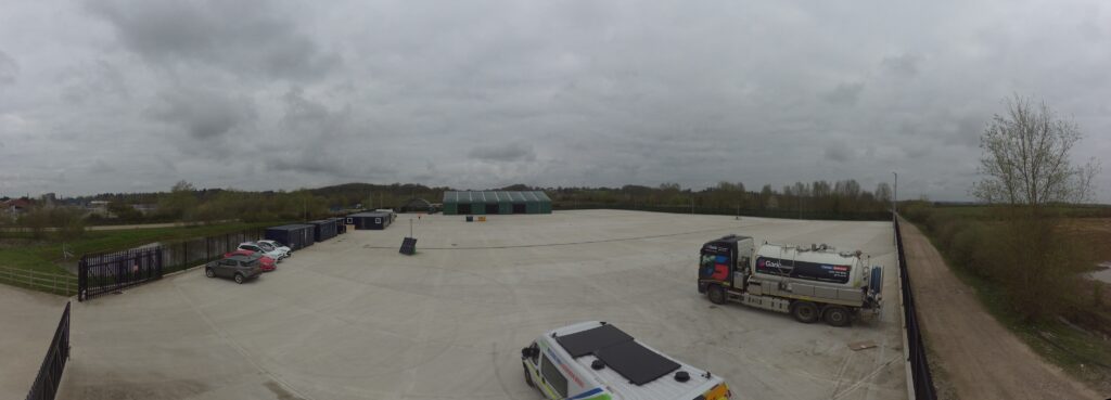 Exterior view of Garic Reading Depot with parking area and storage units.