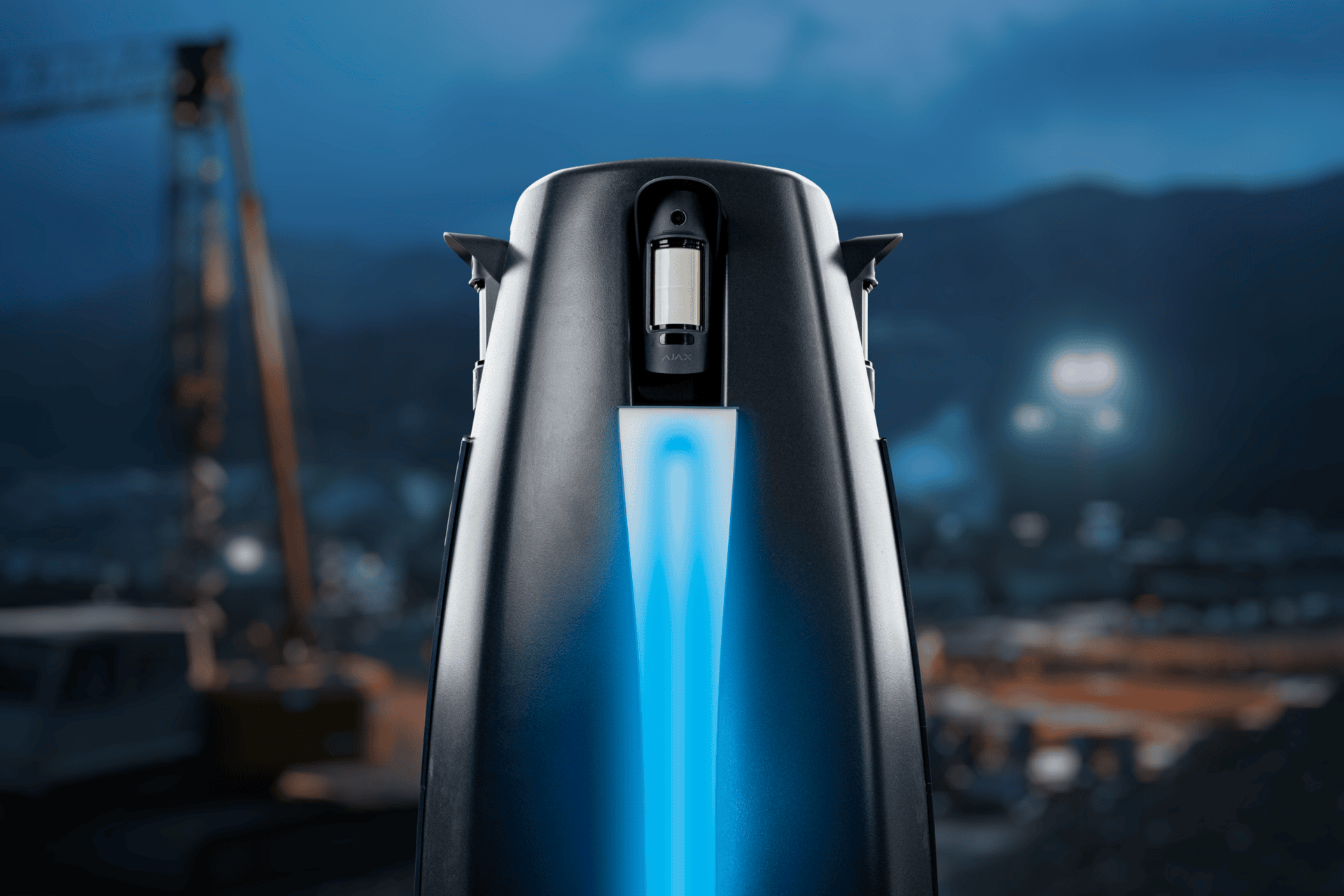 Garic Sentinel success device with blue light in industrial setting.