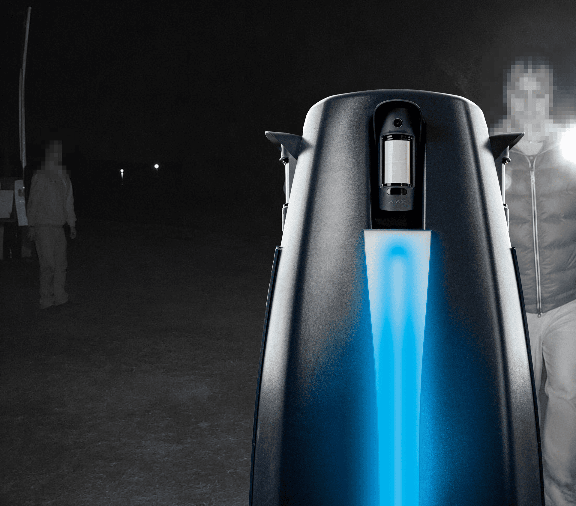 Garic Sentinel waste management machine with blue light at night.